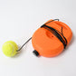 Person practicing with the Tennis Rebound Trainer on a tennis court.