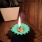 Assorted reusable silicone diyas, highlighting their vibrant hues and intricate patterns.