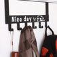 Over door hook rack organizing various clothing items and accessories neatly.