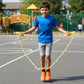 Close-up of yellow and white beaded skipping rope for boys and girls