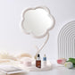 Flower vanity mirror with jewelry and small accessories stored neatly in base tray