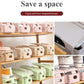 Multiple adjustable shoe slot holders, folded for easy storage when not in use.