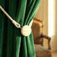 Reusable magnetic curtain holder for lightweight curtains