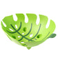 Green plastic leaf-style fruit holder perfect for fruits and vegetables