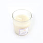 Top view of French Lavender soy candle glowing with warm flame