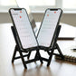 Foldable mini chair mobile phone stand with smartphone placed on it