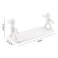 A single floating wall shelf used as a functional display area for small home accents.