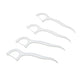 A 50-piece set of MintGuard Portable Dental Floss Picks spread out from their case.