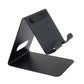 Phone holder placed on table providing stable support for a mobile device