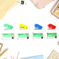 Mini stapler with smooth-action metal stapling mechanism