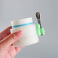 Multi-purpose green hand-shaped wall clip holder for home or office