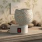 Star cut glass aroma diffuser with fragrance oil creating ambient scent