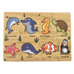 Kid-friendly wooden puzzle featuring bright sea creatures on a learning board.