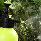 Watering can spray nozzle demonstrating a gentle, wide spray pattern.
