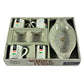 The full Ceramic Snack & Tea Set beautifully arranged on a table with snacks, highlighting its utility for entertaining.