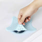 Flexible silicone starfish sink filter, featuring strong suction cups for stability.