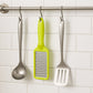 The ergonomic black plastic handle of the stainless steel grater, designed for a comfortable grip.