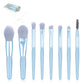 The full 8-piece mini makeup brush set with its compact travel case, ready for use.