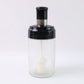 Crystal clear oil dispenser bottle featuring silicone basting brush applicator