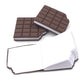 Several chocolate scented diaries in bite-shape, playfully arranged together.