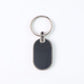 Monogram edge silver and black oval metal key holder accessory