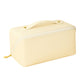 Beige toiletry and makeup pouch with zipper ideal for travel storage