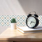 Modern geometric design of detachable tile stickers enhancing a living space.