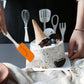 Silicone brush and spatula tools shown in use for mixing cake batter.