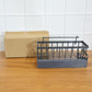 Lightweight durable plastic bathroom rack for organizing shampoo and soap bottles