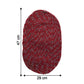 Close-up of red floor mat showing textured fabric