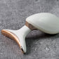 Top view of the Neck Face Massager's massage head and silver sensing rings.