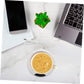 The USB mug warmer packaging, highlighting its features and portability.