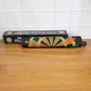 Closed roll-up dartboard in travel tube with included safety darts