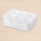 Empty clear plastic fridge storage box ready for organizing food items.