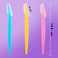 Multiple painless facial razors neatly arranged on a clean white background.