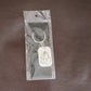 Back view of the Ganesh Metal Keychain, showing its smooth edges and premium finish.