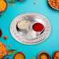Angled view of the plastic Kumkum Thali Holder, highlighting its compact size.
