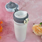 Lifestyle shot of the stainless steel bottle for kids, placed on a school desk.