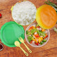 A vibrant burger shape lunch box filled with a balanced meal for kids.