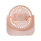 User enjoying cooling from silent mini desktop fan at workspace