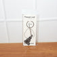Detailed Hanuman Ji sitting pose devotional metal keychain close-up
