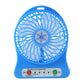 Compact rechargeable mini table fan placed on a desk for workspace cooling