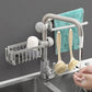 Sink organizer holding towels and brushes on faucet