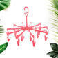 Convenient foldable hanger with clips, ideal for drying cloth diapers and small towels.