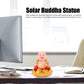 Back view of the durable plastic Solar Buddha Car Ornament, showcasing its solar panel.
