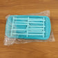 Side view of baby feeding bottle drying rack on kitchen countertop