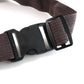Brown canvas waist bag showing detailed zipper and leather accents