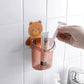 Brightly colored teddy bear toothbrush holder for children