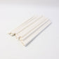Eco-friendly paper straws displayed with green leaf, highlighting sustainable use