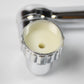 Movable tap water saving filter shown extended, perfect for reaching all areas of the sink.